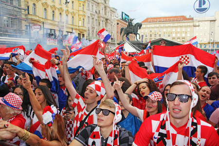 ZAGREB, CROATIA - JULY 07 Croatian football fans on the Ban Jelacic Square, watching 2018 FIFA WORLD CUP RUSSIA match Russia vs Croatia on July 07, 2018 in Zagreb, Croatiaのeditorial素材