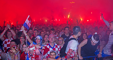 ZAGREB, CROATIA - JULY 11 Croatian football fans on the Ban Jelacic Square, watching 2018 FIFA WORLD CUP RUSSIA match Croatia vs England on July 11, 2018 in Zagreb, Croatiaのeditorial素材