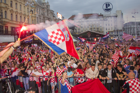 ZAGREB, CROATIA - JULY 11 Croatian football fans on the Ban Jelacic Square, watching 2018 FIFA WORLD CUP RUSSIA match Croatia vs England on July 11, 2018 in Zagreb, Croatiaのeditorial素材