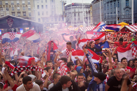 ZAGREB, CROATIA - JULY 11 Croatian football fans on the Ban Jelacic Square, watching 2018 FIFA WORLD CUP RUSSIA match Croatia vs England on July 11, 2018 in Zagreb, Croatiaのeditorial素材