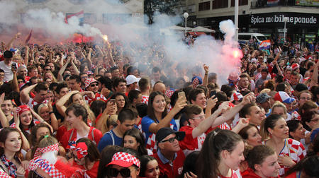 ZAGREB, CROATIA - JULY 15 Croatian football fans on the Ban Jelacic Square, watching 2018 FIFA WORLD CUP RUSSIA match France vs Croatia on July 15, 2018 in Zagreb, Croatiaのeditorial素材