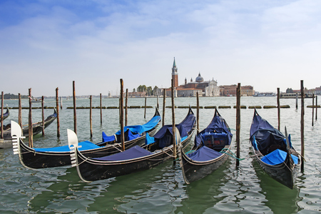 A view of Venice lagoon and gondolas,  the Cathedral of San Giorgio Maggiore, from the Piazza San Marcoの写真素材