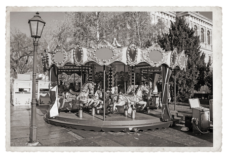 Old fashioned french carousel with horses Vintage Monochrome photoの写真素材