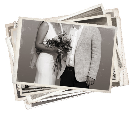 Stack of old photos Young newlywed just marriedの写真素材