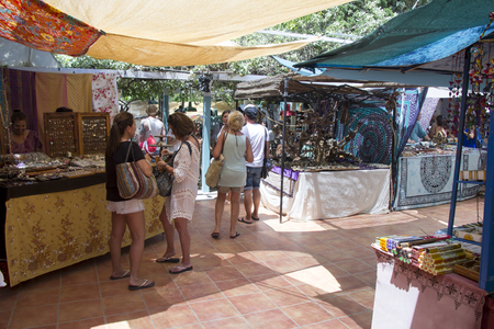 IBIZA, SPAIN - JUNE 24, 2016: Crowd of people and tourists, buying in the small Hippy market of Las Dalias in Ibizaのeditorial素材