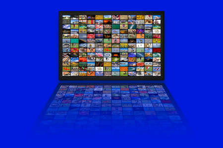 LCD TV panels as Video wall with colorful imagesの写真素材