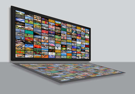 LCD TV panels as Video wall with colorful imagesの写真素材