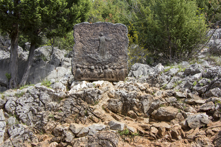 Bronze relief on Apparition hill Podbrdo overlooking the village of Medjugorje in Bosnia and Herzegovinaの写真素材