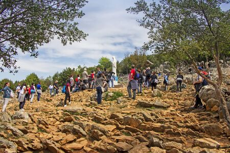MEDJUGORJE, BOSNIA AND HERZEGOVINA - APRIL 21: Apparition hill Podbrdo of the Virgin Mary on April 21, 2019 in Medjugorje, Bosnia and Herzegovina.のeditorial素材