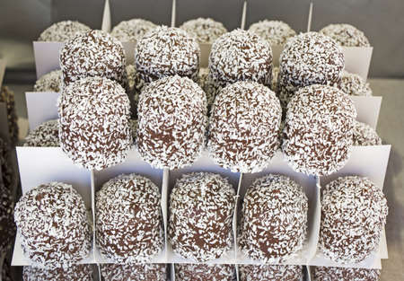 Chocolate candy with coconut in a street marketの写真素材