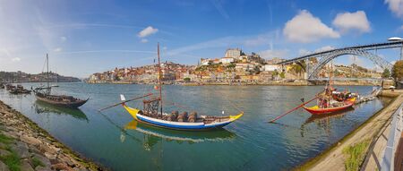 Panoramic view of old town Porto and Douro River with traditional Rabelo boats.の写真素材