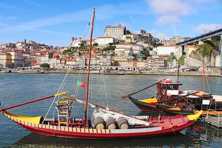 Panoramic view of old town Porto and Douro River with traditional Rabelo boats.の写真素材