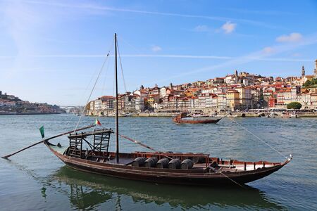 Panoramic view of old town Porto and Douro River with traditional Rabelo boats.の写真素材