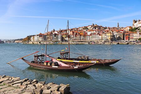 Panoramic view of old town Porto and Douro River with traditional Rabelo boats.の写真素材