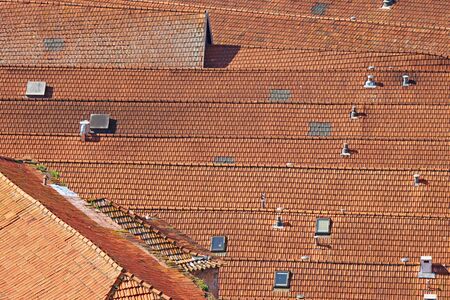 Background of a roof with old roof tilesの写真素材
