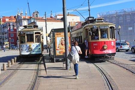 Porto, Portugal - 06. October  2019: Famous old vintage tram on railroad on street of Old Town in Portoのeditorial素材