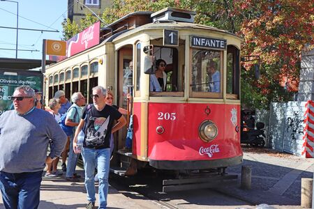 Porto, Portugal - 06. October  2019: Famous old vintage tram on railroad on street of Old Town in Portoのeditorial素材