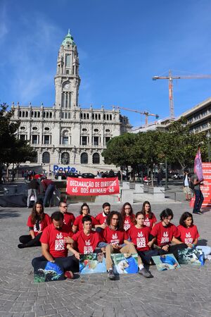 Porto, Portugal - October 05, 2019: Group of young activists are protesting for animal rights. Fight for animals.のeditorial素材