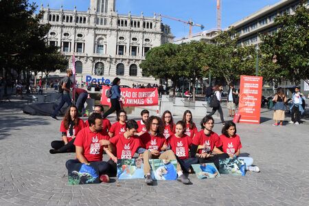 Porto, Portugal - October 05, 2019: Group of young activists are protesting for animal rights. Fight for animals.のeditorial素材