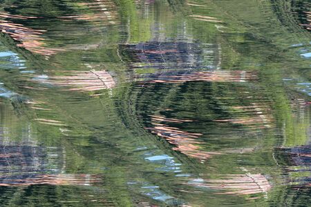 Reflection of the coast on the surface of the water as seamless backgroundの写真素材