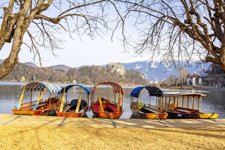 Traditional wooden boats on Lake Bled in Sloveniaの写真素材