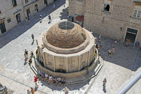 Dubrovnik, Croatia - September 04, 2020: Many tourists near the big Onfrio fountain with waterのeditorial素材