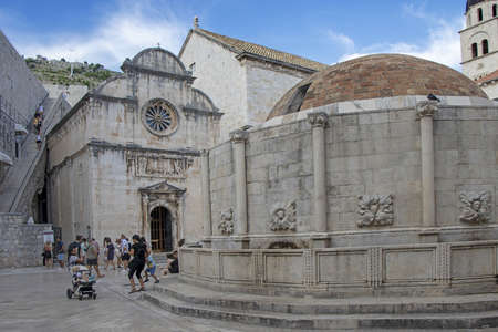 Dubrovnik, Croatia - September 01, 2020: Many tourists near the big Onfrio fountain with waterのeditorial素材