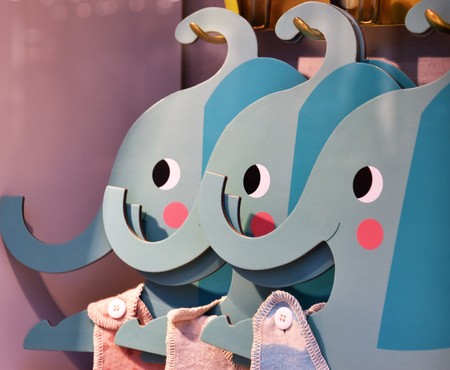 Three cute baby elephant hangersの写真素材