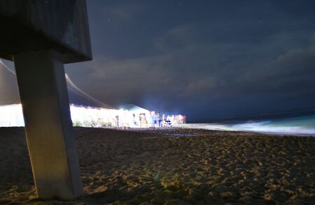 A creepy photo as if someone is watching a party from a distanceの写真素材