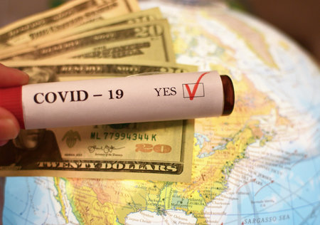 Covid-19 Vial with North America Map and US dollars
