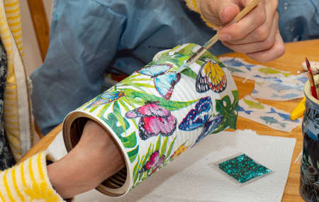Arts and crafts decoupage with kidsの写真素材