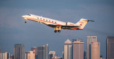 Tampa, FL, July, 2021 - A private Hard Rock hotel jet is taking off from Tampa International airportのeditorial素材