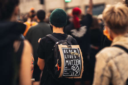 London / UK - 06/27/2020: LGBTQ protesters with banners in medical masks At Black Lives Matter Protestのeditorial素材