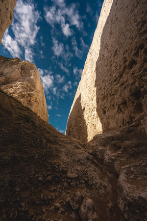 Broadstairs, Kent / UK -  2020.08.01: Empty Kingsgate Beach, walking through the chalk stacks clifs at Botany Bay in Kent, England.の写真素材