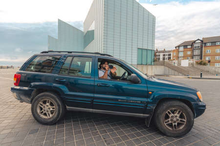 Margate / UK -  2020.08.01: Man taking photo of the beach from the carのeditorial素材