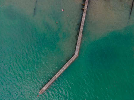 Drone Aerial shot of Beautiful sand beach in East England packed with people during Coronavirus Pandemicの写真素材