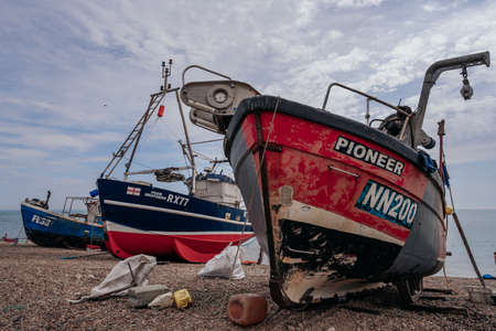 Hastings Port, East Sussex / UK -  2020.08.08: Hastings fishing boats on the beach at Rock-a-Noreのeditorial素材