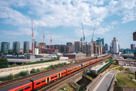 London / UK - 08/09/2020: Landscape view of trains going to Waterloo station at New Covent Garden Market.のeditorial素材