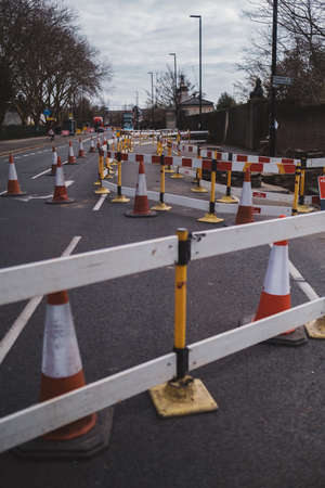 Brentford, West London | UK -  2021.03.21: Road Works Maintenance by Gas workers replacing old pipesのeditorial素材
