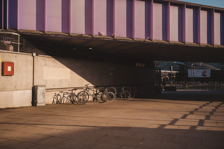 Shepherd's Bush, London | UK -  2021.03.22: Bicycles parked under the bridge on sunsetのeditorial素材