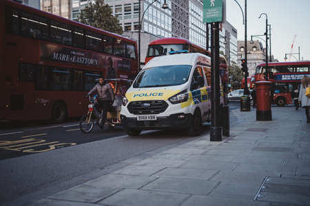 Soho, London | UK -  2021.04.16: Police Van parked at Oxford Street Road sidewayのeditorial素材