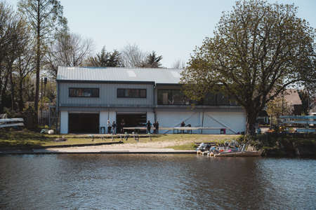 Staines-upon-Thames, Spelthorne | UK -  2021.04.24: Young people preparing boats at the rowing clubのeditorial素材