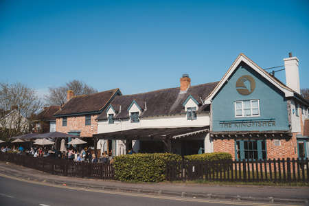 Staines-upon-Thames, Spelthorne | UK -  2021.04.24: The Kingfisher pub restaurant open on warm Spring day in Chertseyのeditorial素材