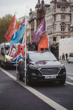 Westminster, London | UK - 2021.05.08: Hundreds of people with flags in a London march to support veterans.のeditorial素材