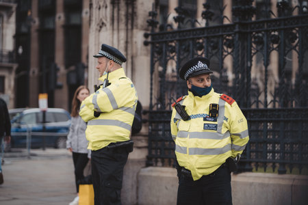 Westminster, London | UK -  2021.05.08: Police officers in a London march to support veterans.のeditorial素材