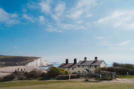 East Sussex | UK -  2021.04.04: Tiny House at the edge of the Chalk Cliffs at Seaford Head Nature Reserve,  Cuckmere Haven beach. Seven Sisters, South of Englandのeditorial素材
