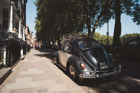Vauxhall, London | UK - 2021.06.13: Black and white vintage VW Volkswagen bug parked on sunny day in west Londonのeditorial素材