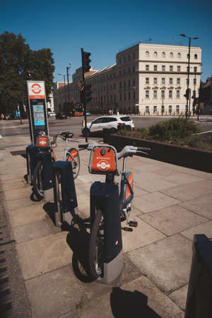 Vauxhall, London | UK - 2021.06.13: Boris Santander bikes parked in Vauxhall area on sunny summer dayのeditorial素材