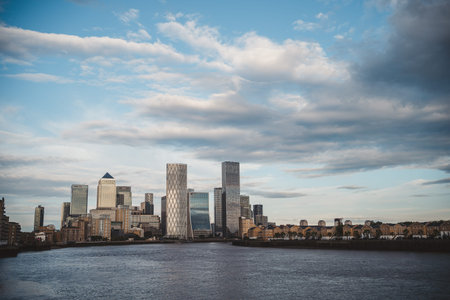 Thames River Embankment, London | UK - 2021.06.26: The view of Canary Wharf from the embankment on...