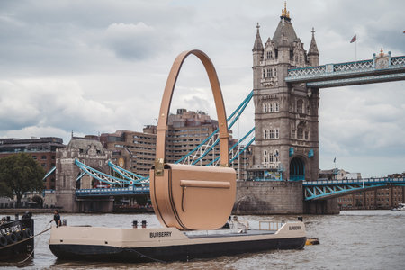 Thames River Embankment, London | UK - 2021.06.26: Burberry Olympia bag floating down the Thames...
